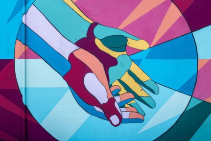 colorful painting of hands
